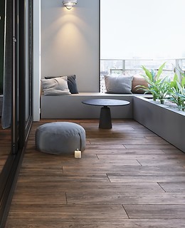 Modern dark wood-alike gres tiles from Opoczno on the balcony